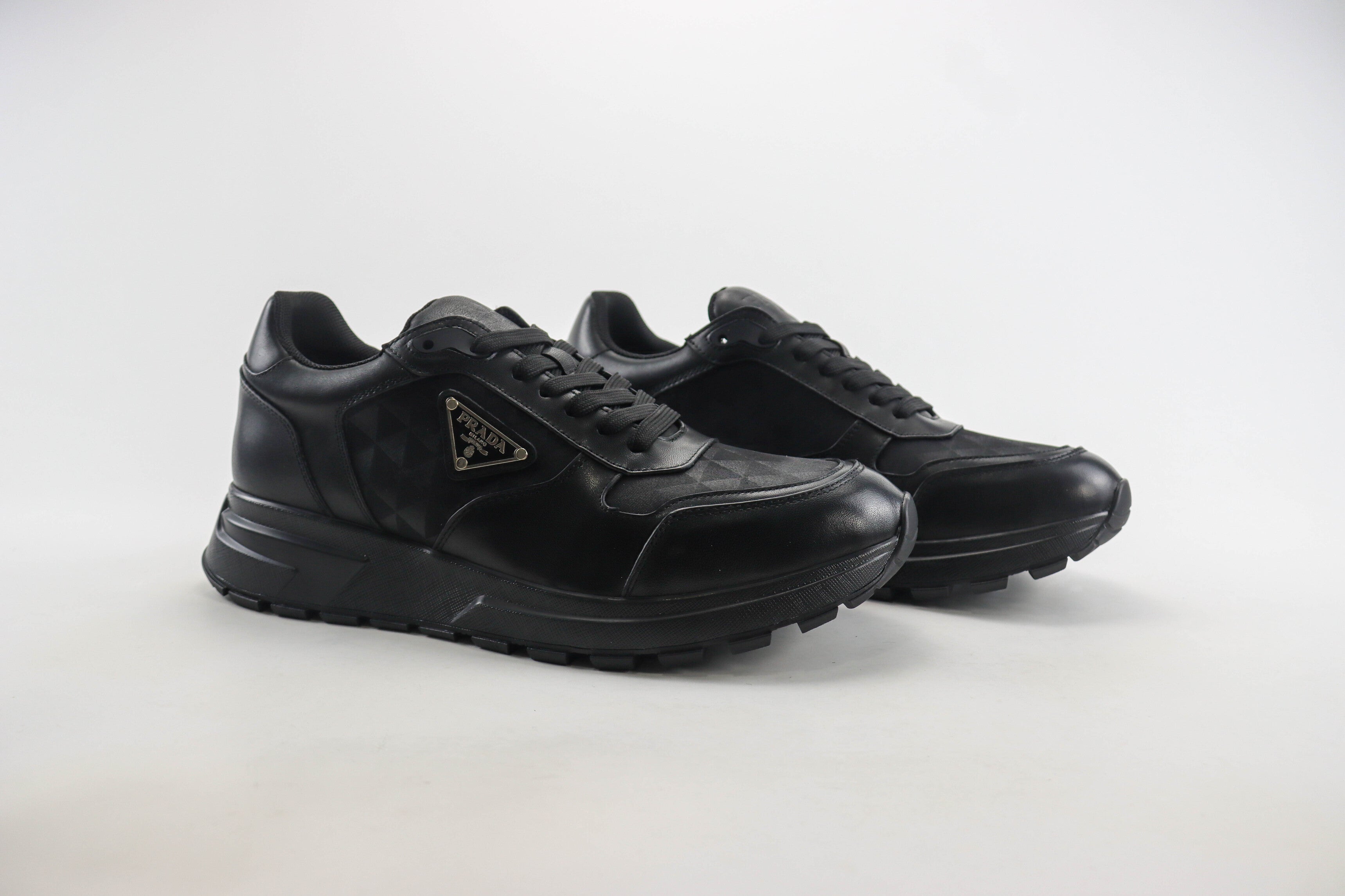 Prada Couro e Re-Nylon